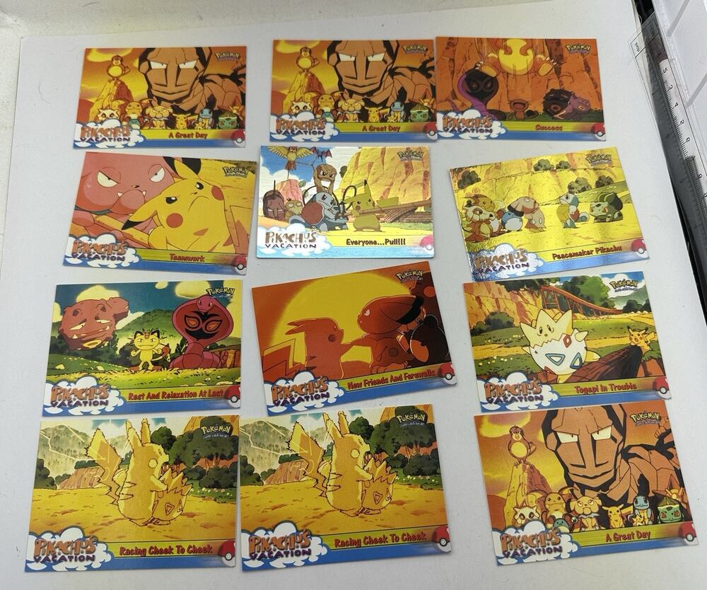 1999 Topps Pokemon Movie Pikachu’s Vacation Lot Of 12 cards 2 holos NM-LP